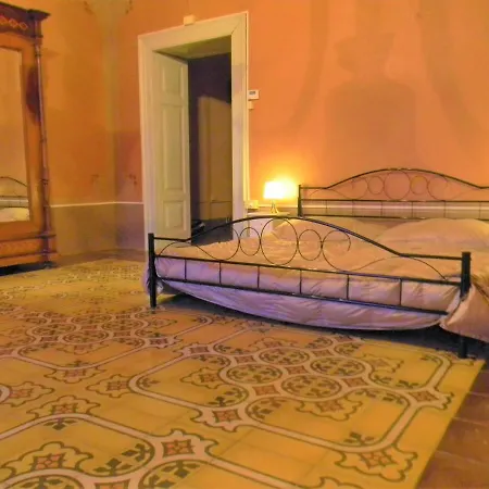 Romano Puglia *